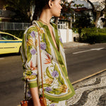 Farm Rio green botanical print shirt with tropical floral motifs, button-front design and relaxed long-sleeve silhouette.