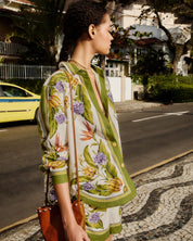 Farm Rio green botanical print shirt with tropical floral motifs, button-front design and relaxed long-sleeve silhouette.