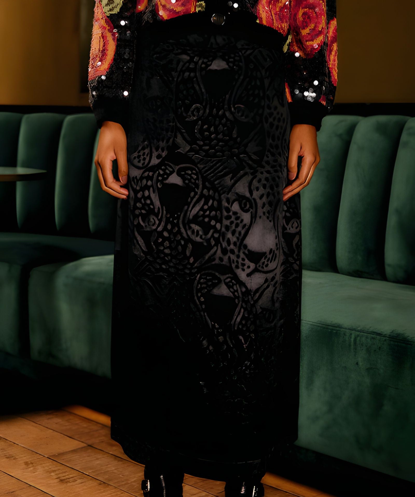 Front view focal shot showcasing the elegant drape, fluid movement, and subtle leopard texture of the FARM Rio black jacquard maxi skirt.