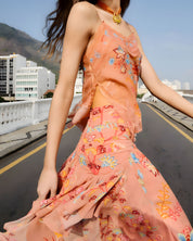 Side view of a model styling the sleeveless mocha Farm Rio lace blouse.