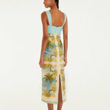 Back view of the FARM Rio Royal Sea multicolour maxi dress worn by a model