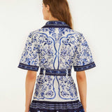 FARM Rio Off-White Porcelain Garden Mini Dress view featuring a porcelain-inspired floral print and flattering mini silhouette.