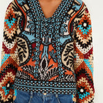 FARM Rio Balamana crochet sleeve sweater – close-up on the model