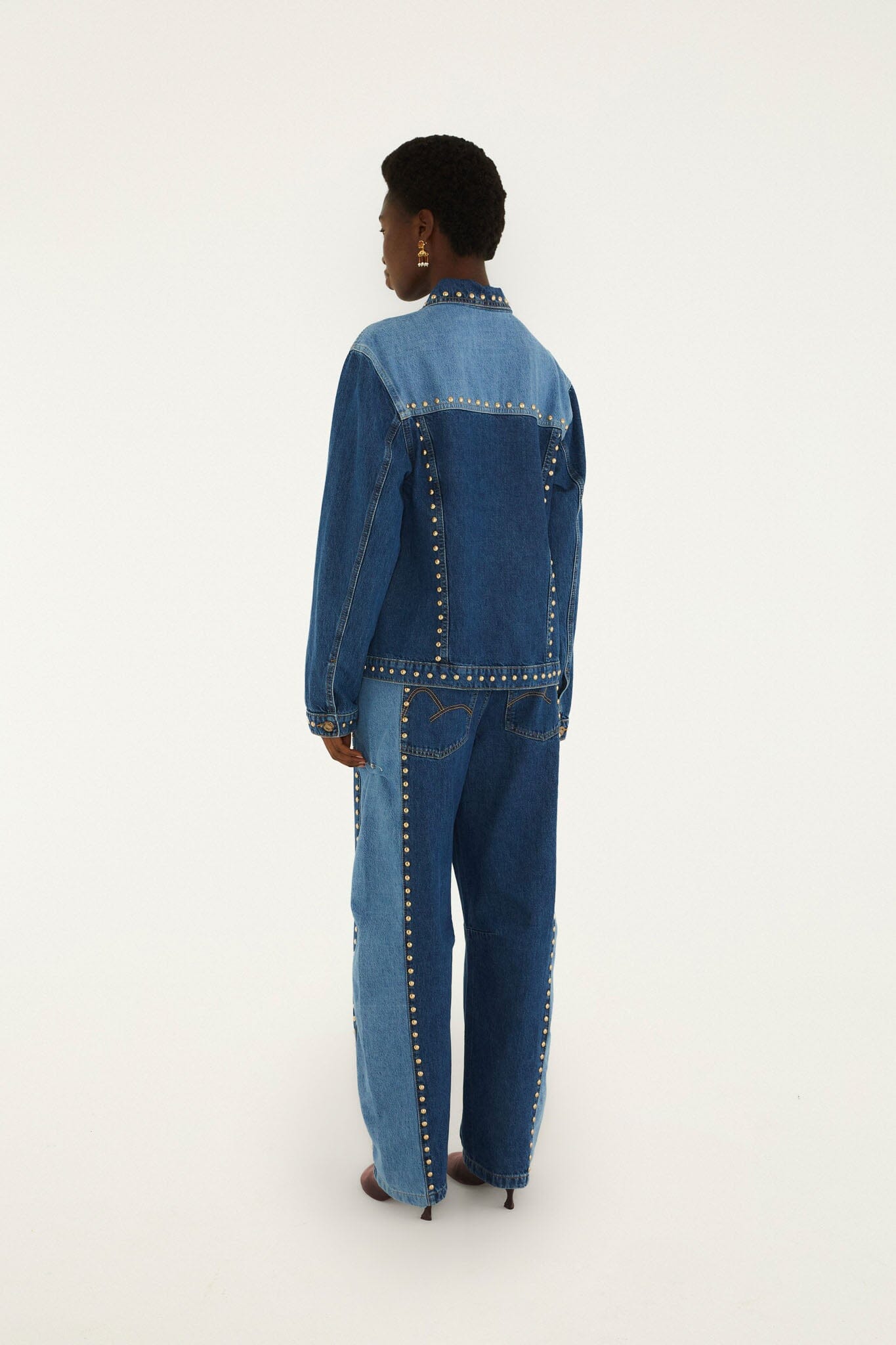 Farm Rio Studs Metal denim trousers with gold studs along the side seams – back view