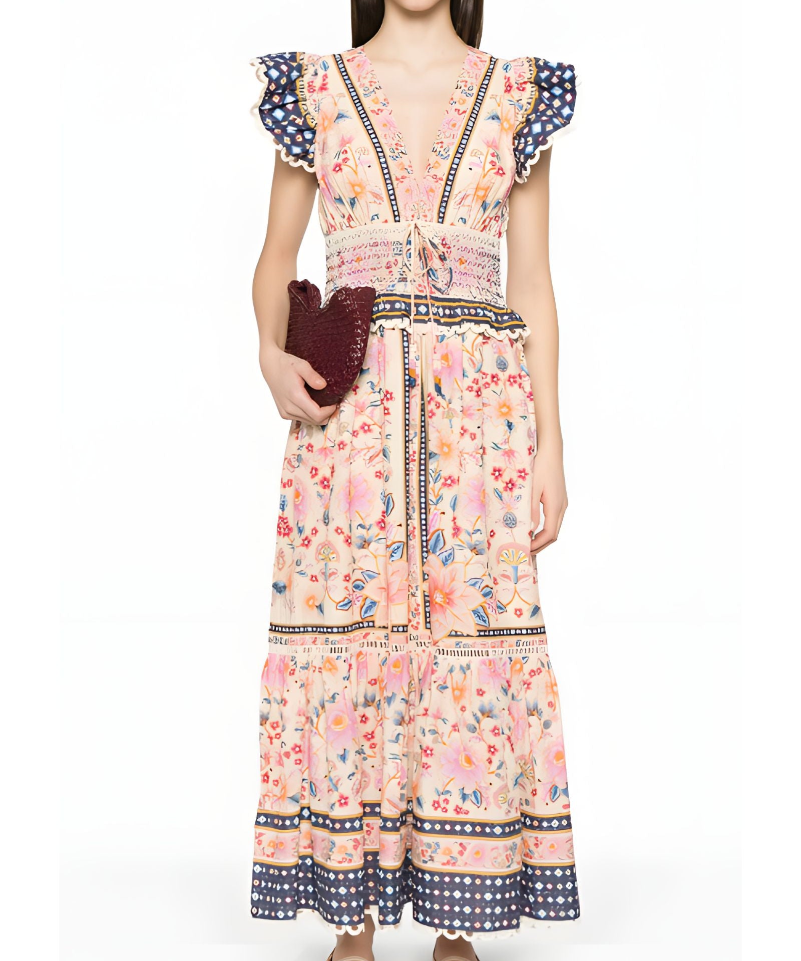 Full-length front view of a model styling the Farm Rio floral tapestry maxi dress, accessorized with a dark clutch bag.