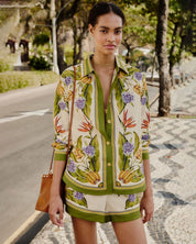 Farm Rio tropical botanical print shirt in green and cream with floral and banana motifs, relaxed fit and button-front design.
