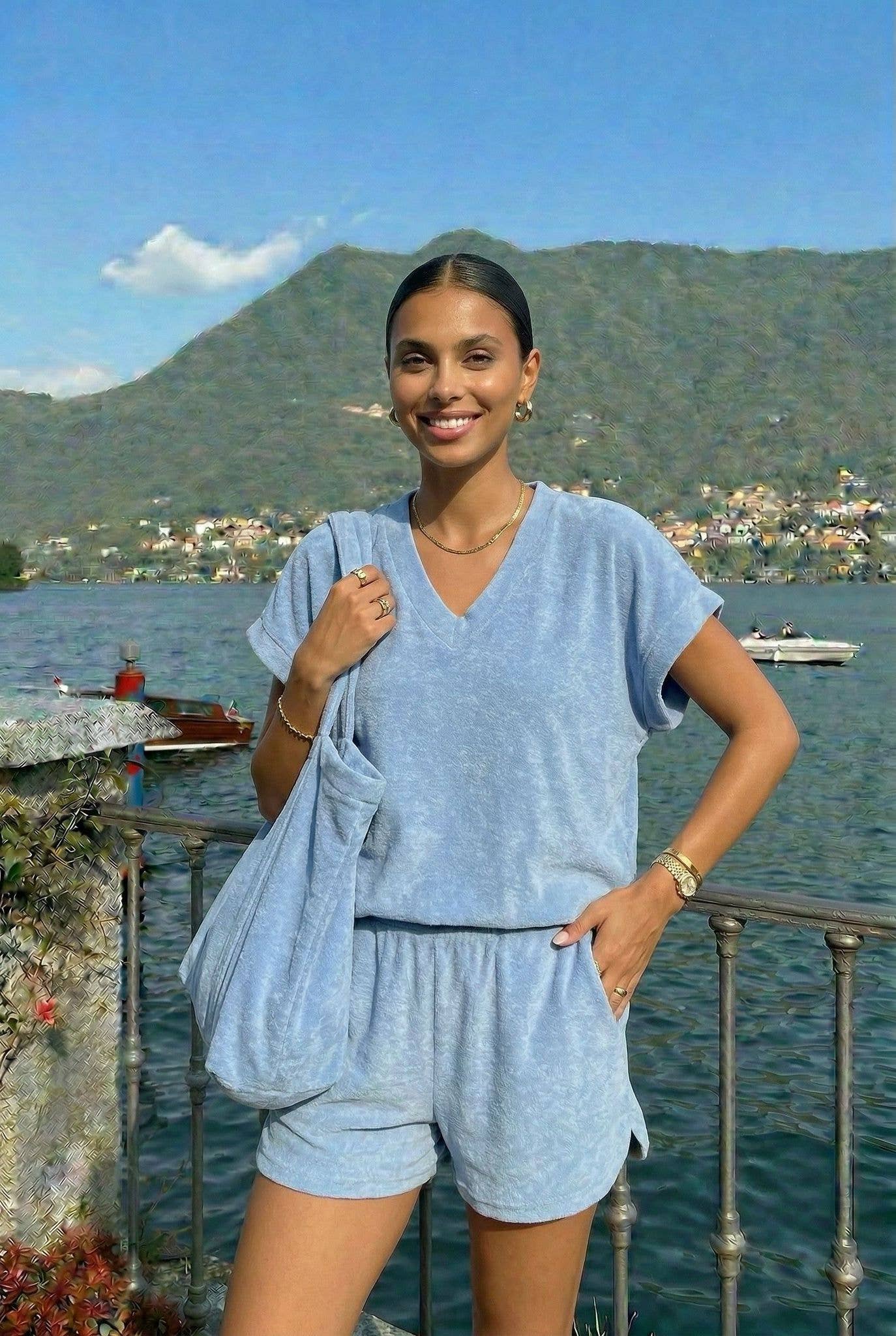 Soft Terry Cloth Shorts by INCERTAINES — model wearing the terry shorts with matching top, front view