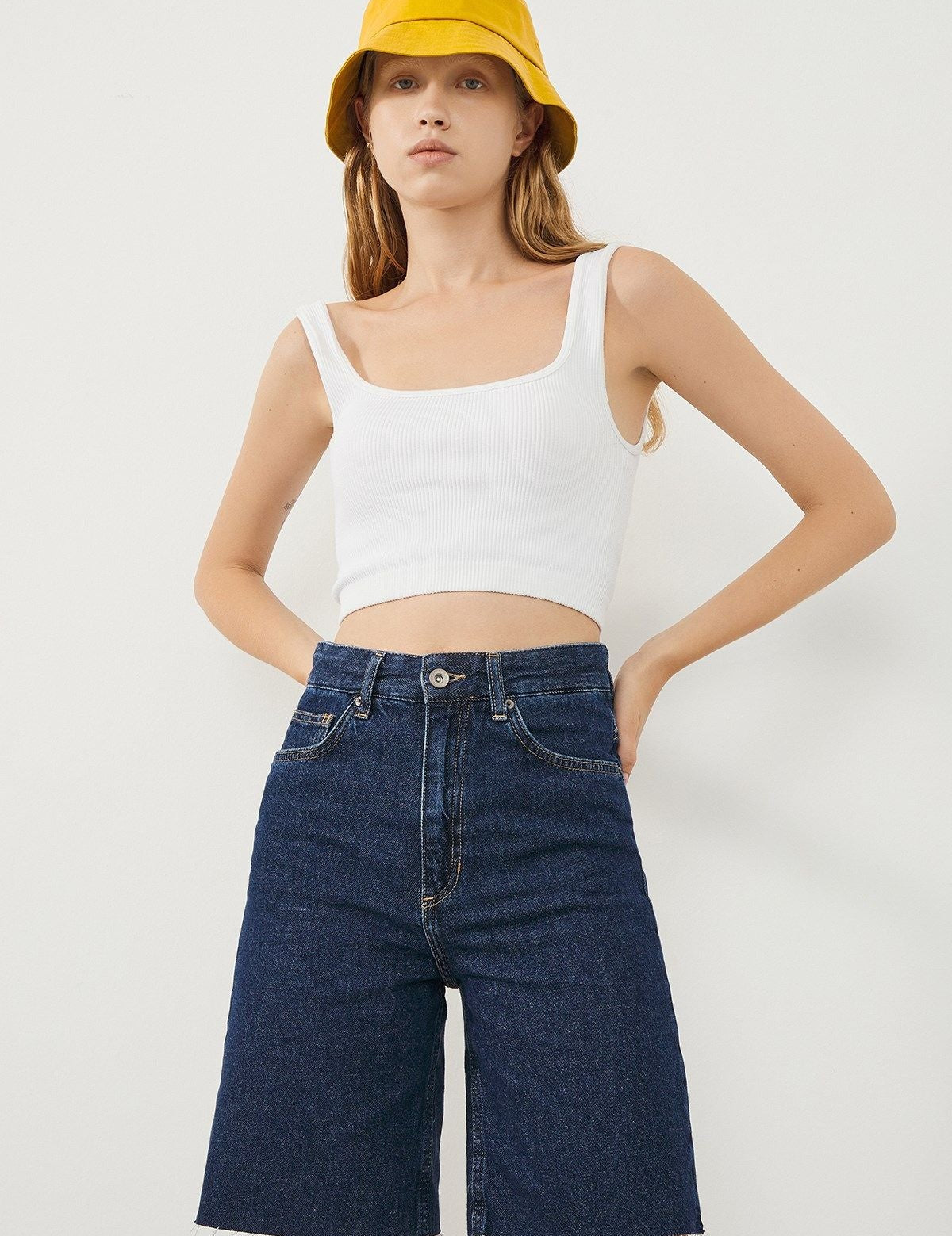 Woman wearing Vera Dark Blue A-Line Bermuda Shorts, front view