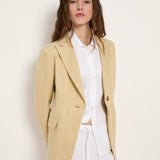 Khaki-creme single-button blazer on model, front view, worn with white shirt.