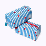 Two KIKOONI Love Edition blue cosmetic bags stacked