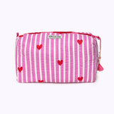 KIKOONI Love Edition pink cosmetic bag with tassel zip – angled front view