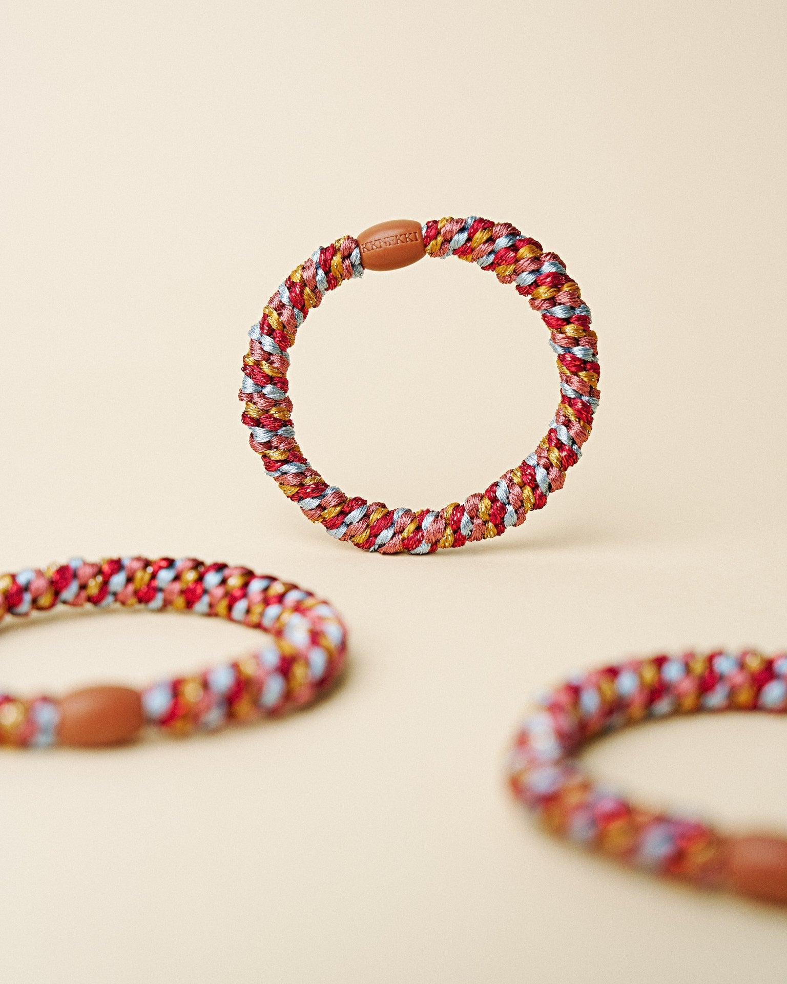 KKNEKKI hair tie Burgundy & Curry Mix – several hair ties together