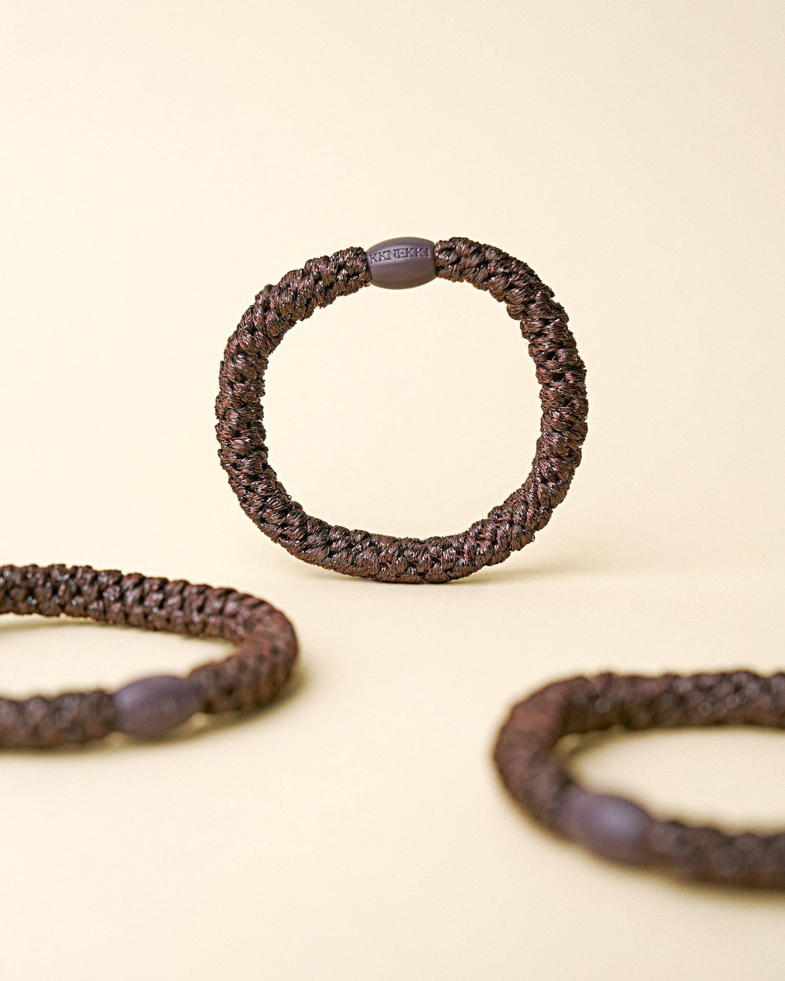 KKNEKKI hair tie Chocolate Glitter – several hair ties together