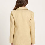 Clean back view of the LANIUS blazer in khaki-creme, showcasing the elegant fall, straight cut, and smooth drape of the sustainable design.