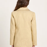 Clean back view of the LANIUS blazer in khaki-creme, showcasing the elegant fall, straight cut, and smooth drape of the sustainable design.