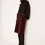 LANIUS oversized jumper in chocolate tweed with a ribbed high neck, worn by a model