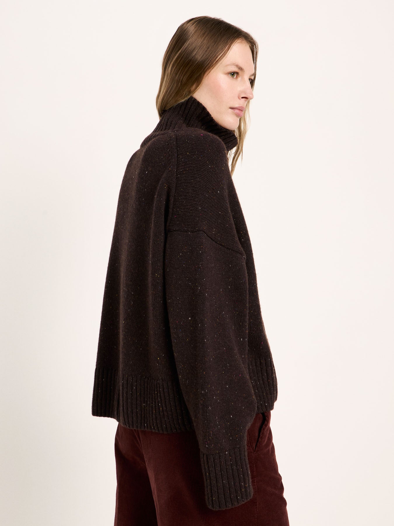 LANIUS oversized jumper in chocolate tweed with a ribbed high neck, side view