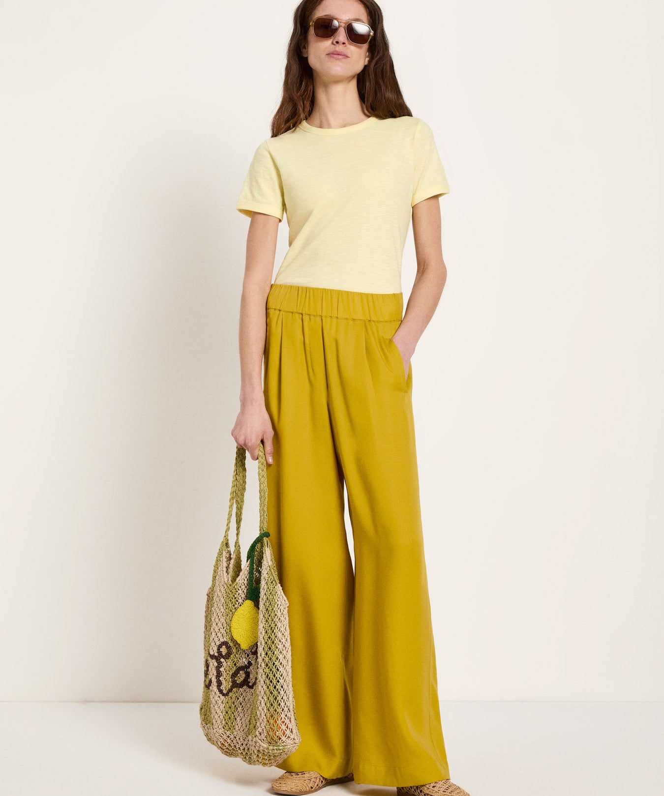 Wide-leg trousers - Dark Kiwi by LANIUS — fair fashion in organic materials, front view