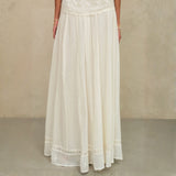 Mid-length view of the flowing cream cotton artisan maxi skirt by Mabe Apparel.