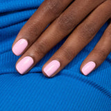 Manucurist Green Flash™ LED nail polish in Candy, pop pink, worn on short nails