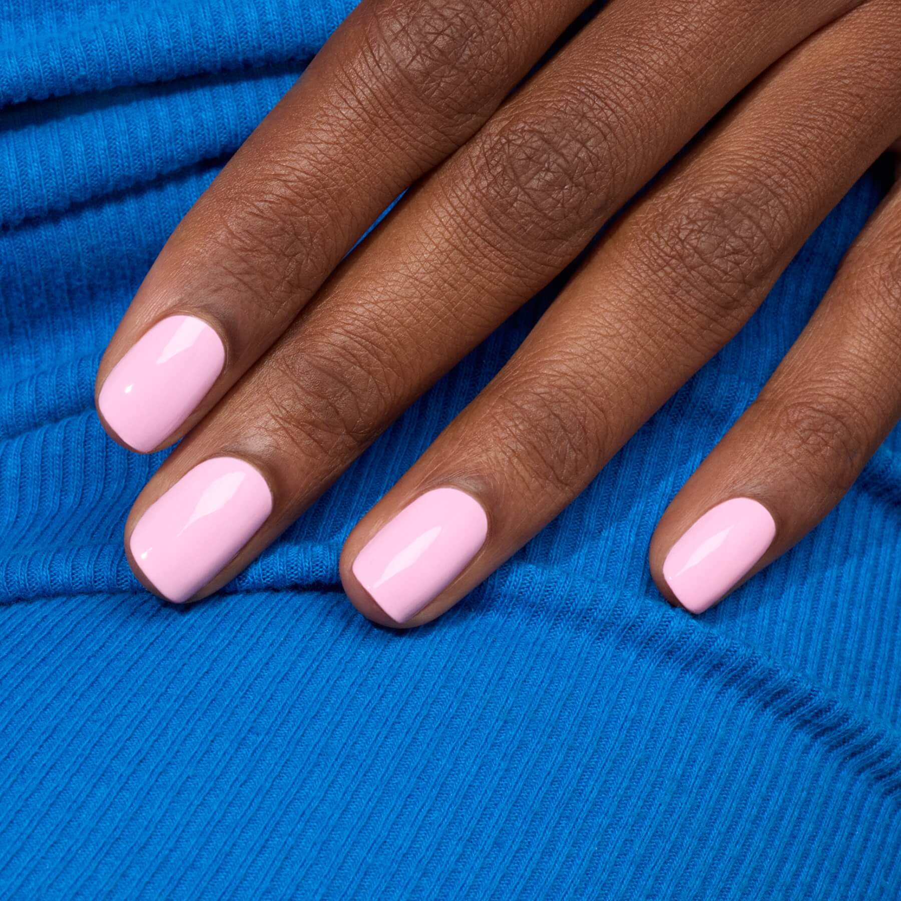 Manucurist Green Flash™ LED nail polish in Candy, pop pink, worn on short nails