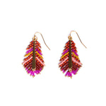 Vibrant magenta and orange beaded earrings in a feather-inspired shape, handmade by Colombian artisans for Mayana Designs