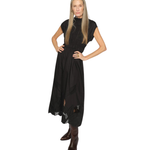 Model in motion wearing the MOS MOSH MMAria Mono dress. Highlights the flowing midi skirt and refined sleeveless cut in black organic cotton.