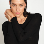 Close-up of MMElaine Seamless Silk Tee in Black, sleeve detail