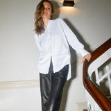 Model wearing MMEnola Shirt in White, front pose