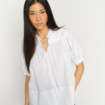 White MMTarima cotton blouse close-up showing band collar and sleeve details