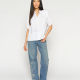 White MMTarima cotton blouse with band collar, front view on model