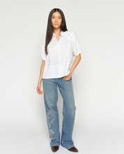 White MMTarima cotton blouse with band collar, front view on model