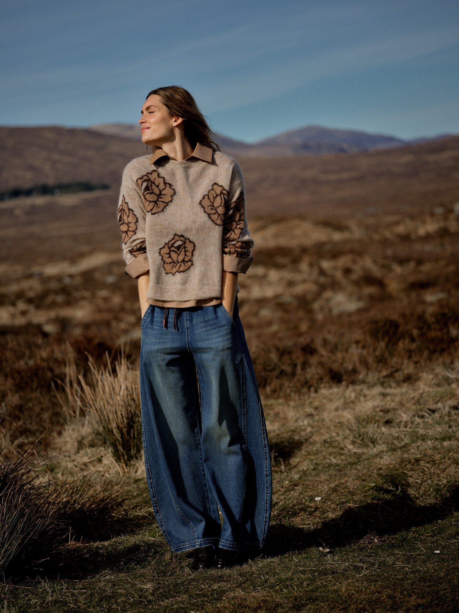 MOS MOSH Drea Popli round-neck jumper with brown jacquard roses on mottled beige, lifestyle shot