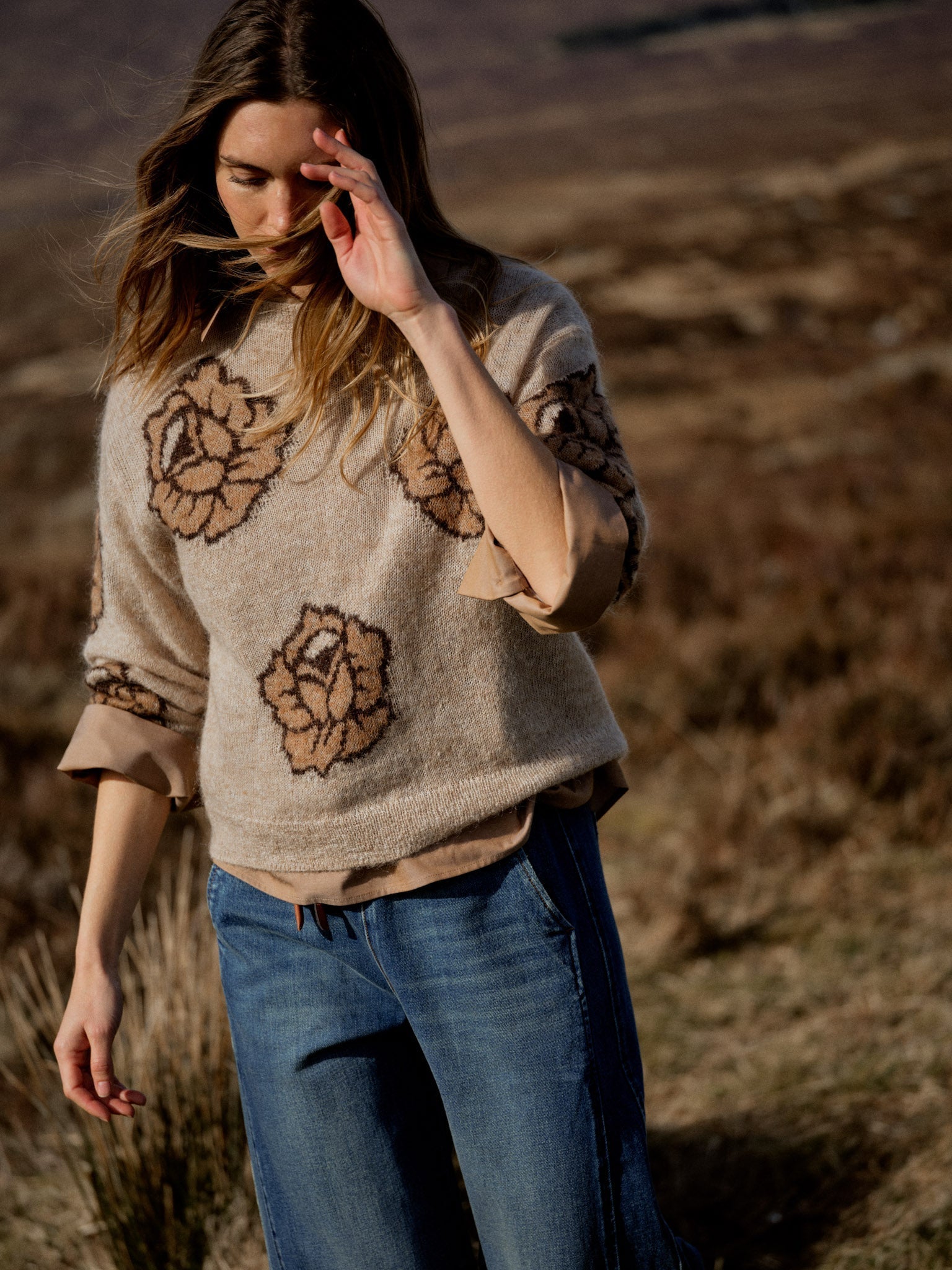 MOS MOSH Drea Popli round-neck jumper with brown jacquard roses on mottled beige, worn by a model, front view