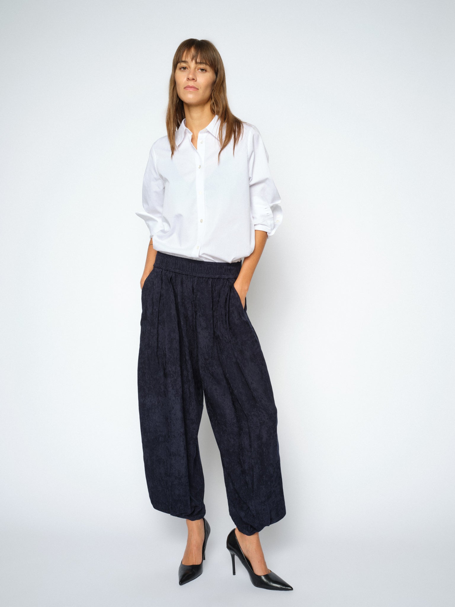 MOS MOSH Nuello Trellis 7/8 balloon trousers in salute navy with a balloon leg gathered at the ankle, worn by a model