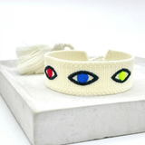 EVIL EYE Statement Woven Bracelet — Ecru by Parsley & Pepper — handwoven embroidered bracelet, front view