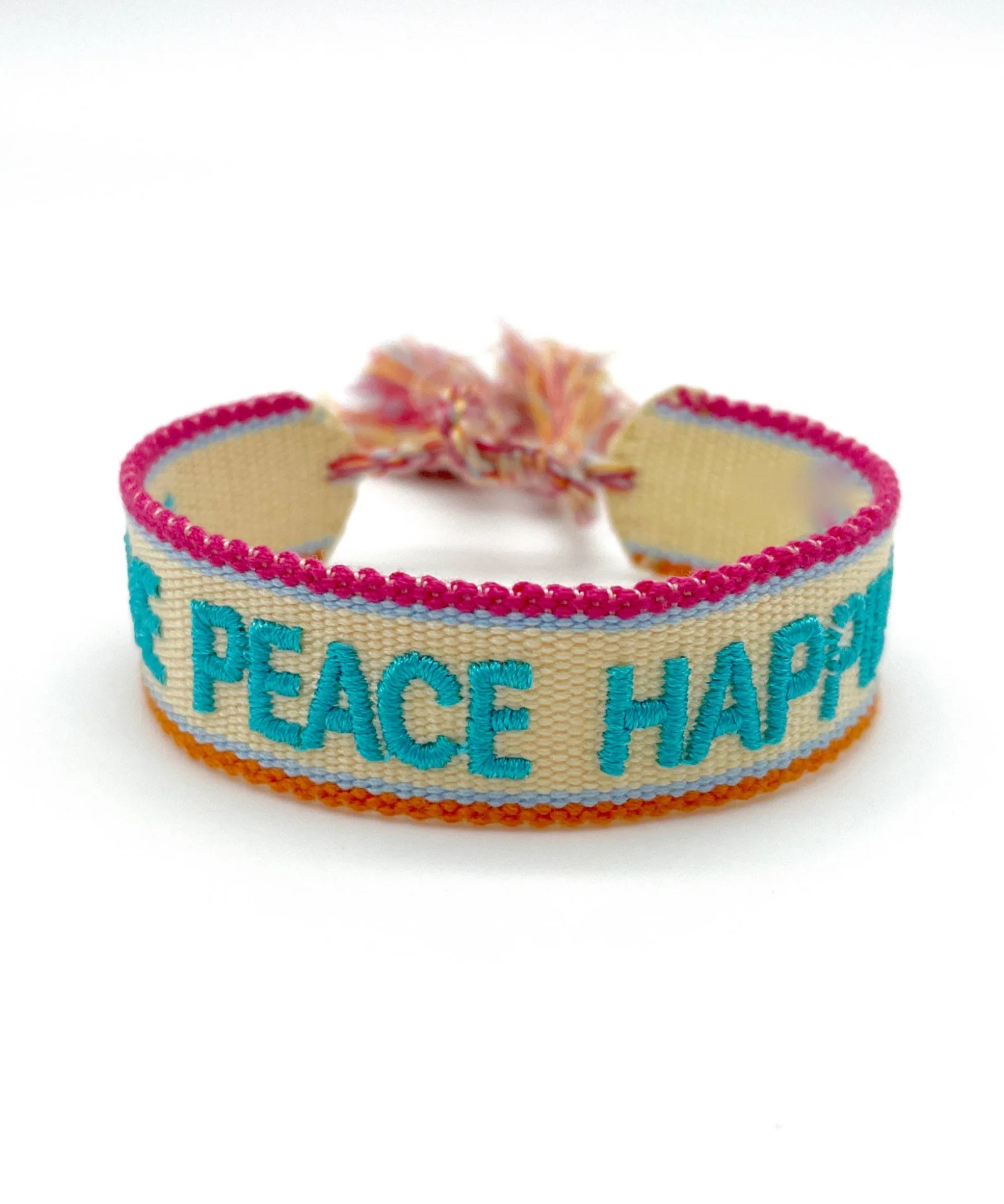 Close-up of adjustable woven turquoise friendship bracelet with embroidered “LOVE PEACE HAPPINESS” lettering and sliding knot tassel cords.