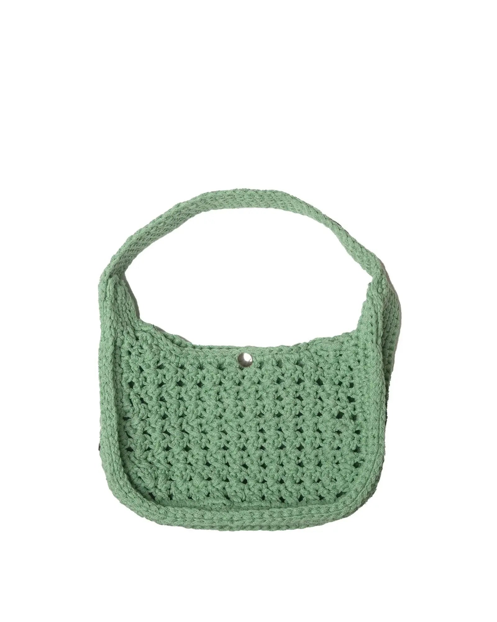 Riviera Lili crocheted cotton shoulder bag in sage green, front view on white background — Atelier Bagatelle