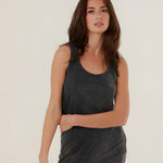 A mid-shot of a model wearing the charcoal carbone Top Mia tank top, highlighting the classic scoop neck and relaxed straight fit.