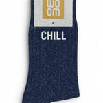 Side profile view of the navy blue glitter sock showing the comfortable elasticated ankle and the clean white CHILL wording detail.