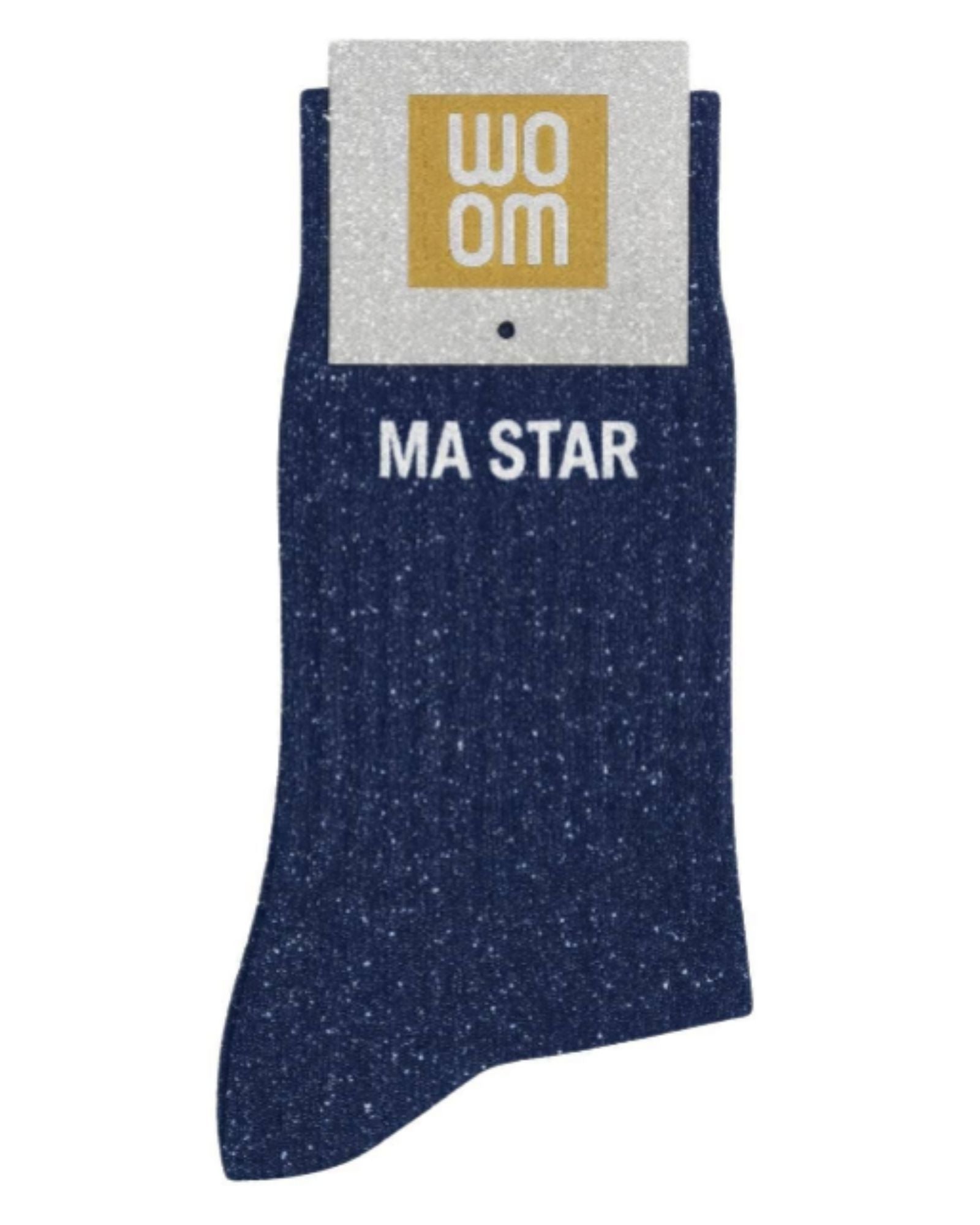 Deep navy glitter message socks with a white jacquard MA STAR inscription at the ankle, presented in their original Woom paper packaging.
