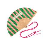 Close-up view of the opened green and pink striped wooden fan, showcasing the high-quality fabric finish, contrast typography, and attached pink strap.