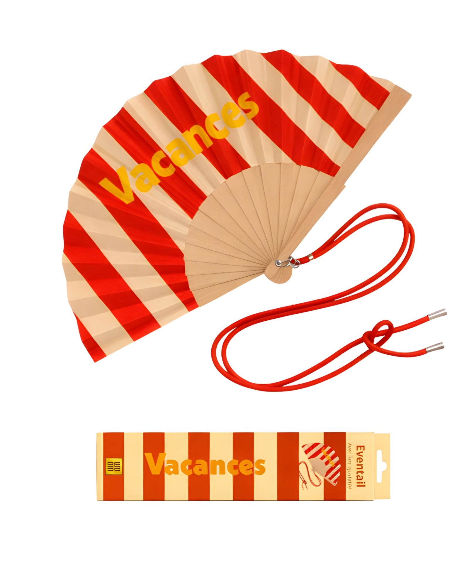 An opened summer folding fan with a red and beige striped pattern and bold yellow VACANCES typography, displayed next to its red shoulder cord and matching packaging.