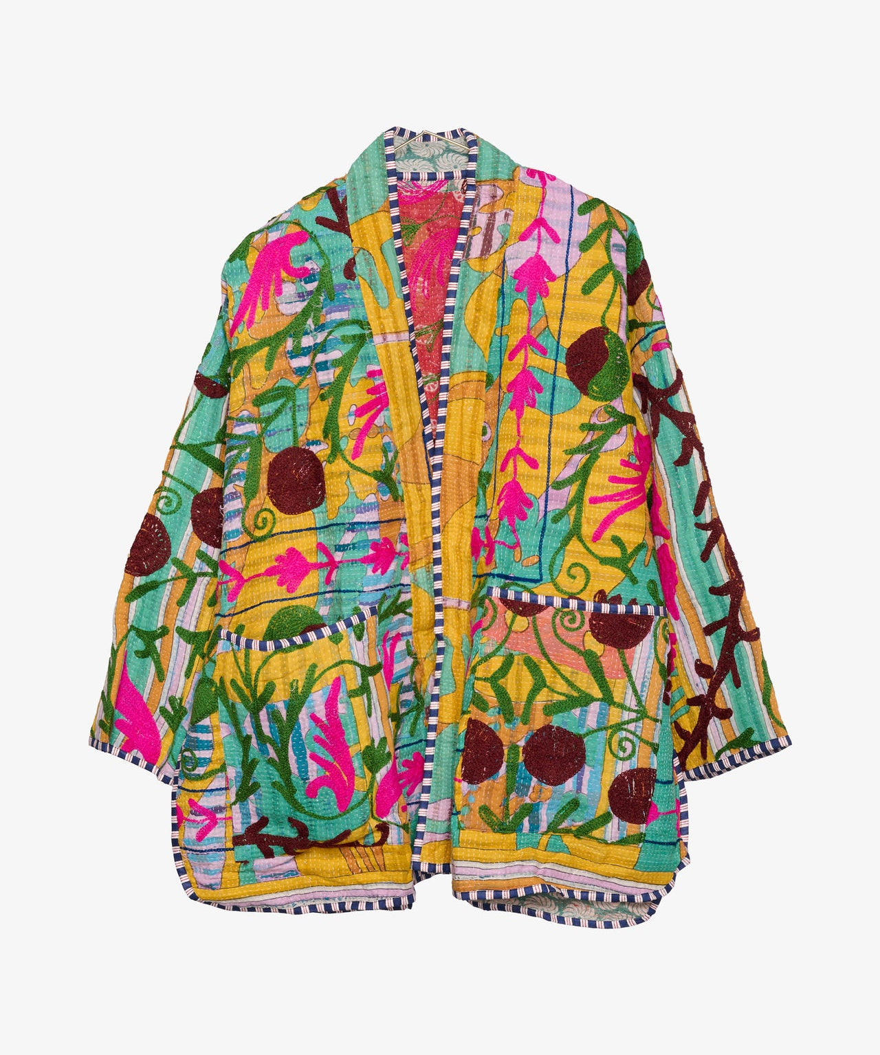 A brightly colored women's jacket embroidered with flowers and leaves by Sissel Edelbo