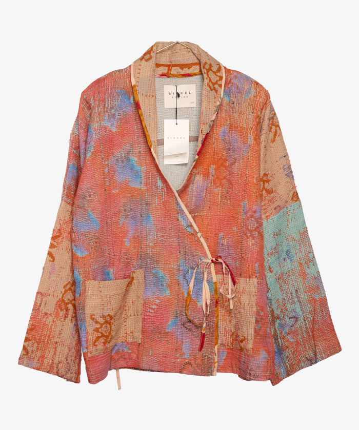 An orange and blue women's jacket with a tie-in front, upcylced from Kantha fabric.