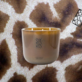 Bykoko After Ski luxury decorative 1kg scneted candle with fresh pine amber, vanilla, and leather notes. Hand-poured in a premium glass vessel, made in Switzerland.