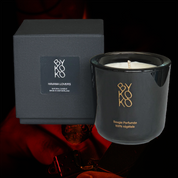Bykoko Havana Lovers scented candle in an elegant black glass vessel, featuring notes of Bergamot, Sandalwood, and Tonka Bean. Handmade in Geneva.