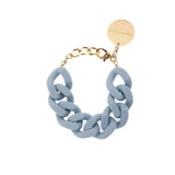 Vanessa Baroni flat chain bracelet in matt blue with sleek acetate links and adjustable gold hardware for a minimalist, modern accessory.